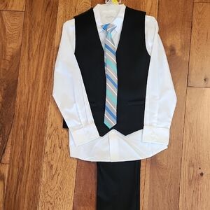Boys Black Vest, White Dress Shirt with Striped Clip On Tie, Black Dress Pants.